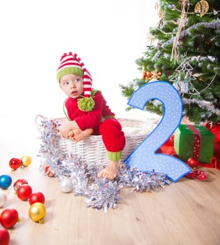 2 year old baby boy Christmas shooting in studio.