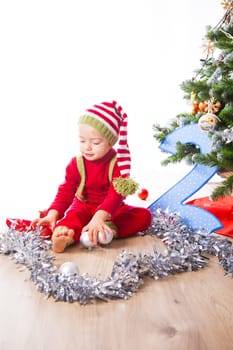 2 year old baby boy Christmas shooting in studio.