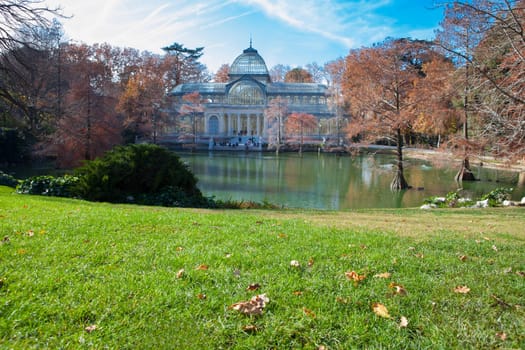 Crystal Palace building and pond in Retiro Park, Madrid, Spain
