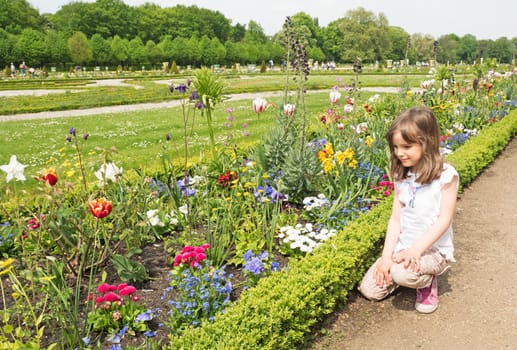 Child considers flower discounts in spring