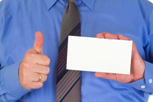 Businessman holds white sheet of paper
