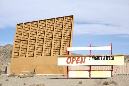 A car cinema in the middle of the Mojave Desert near Barstov.