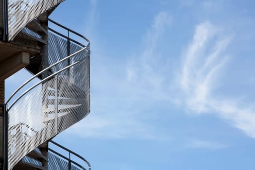 Spiral staircase and a beautiful sky