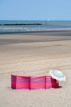 Well protected against the wind on a beach in the North of France