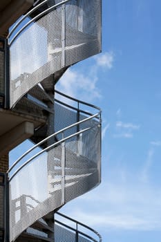 Spiral staircase and a beautiful sky