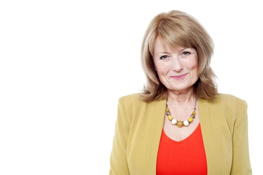 Confident smiling aged woman in trendy wear