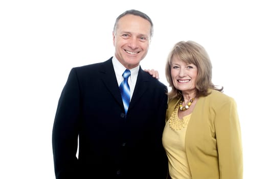 Happy elderly couple together on a white background