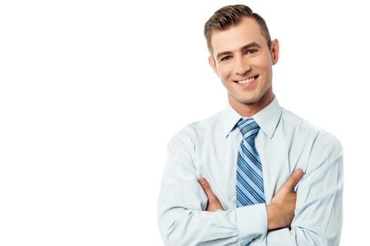 Smiling business entrepreneur posing with crossed arms