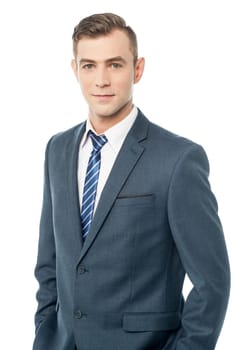 Handsome young executive posing to the camera