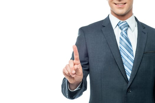 Cropped image of businessman showing index finger