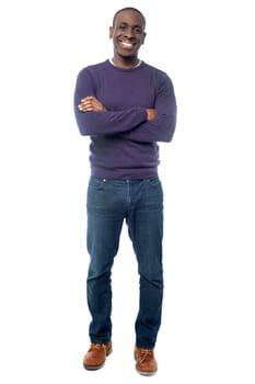 Full length image of a casual man posing over white