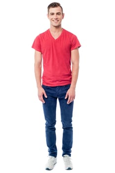 Handsome guy posing in casuals over white
