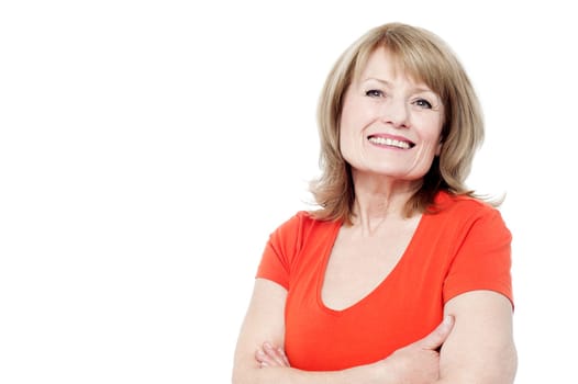 Smiling beautiful aged woman in trendy wear