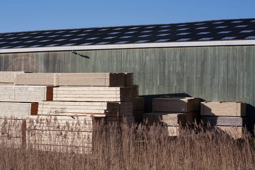 Stacked lumber waiting for transportation