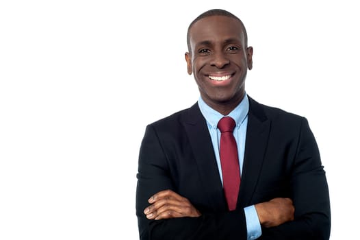 Smiling young professional posing to camera over white