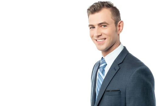 Side pose of young businessman over white