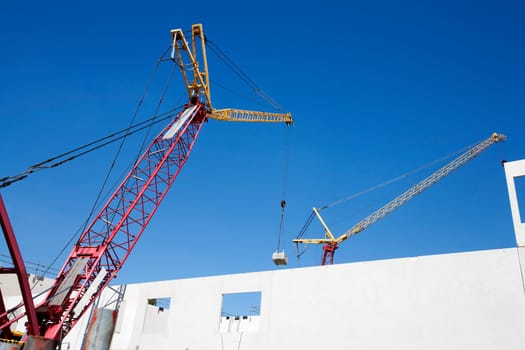 Crane lifting construction materials