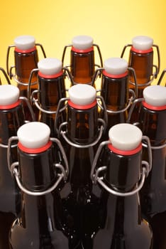 Close-up of many beer bottles with ironing closure