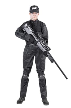 Female police officer SWAT in black uniform with sniper rifle studio shot