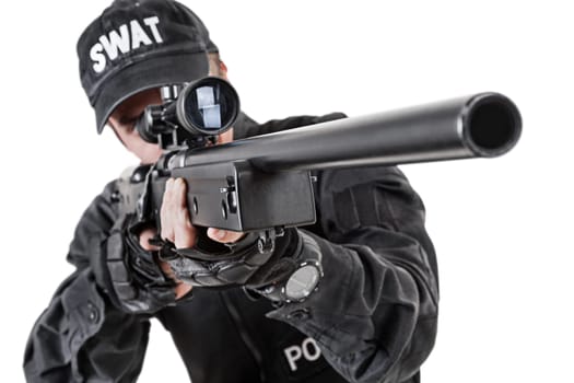 Spec ops police officer SWAT in black uniform studio