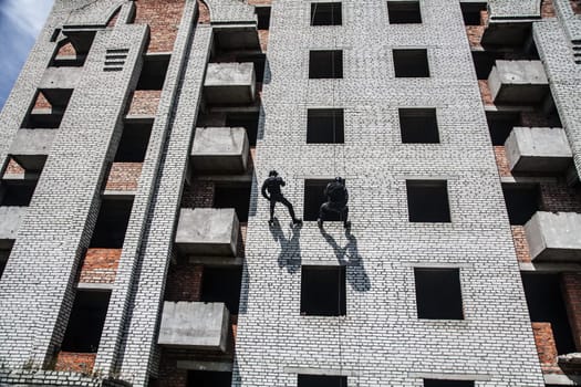 Spec ops police officer SWAT during assault operation