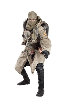 Nuclear post apocalypse. Studio shot of survivor in tatters and gas mask