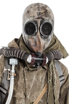 Nuclear post apocalypse. Studio shot of survivor in tatters and gas mask