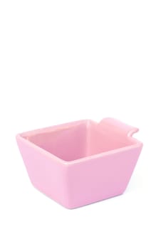 Pink ceramic bowl isolated on white background, stock photo