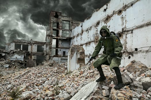 Post apocalypse. Sole survivor in tatters and gas mask on the ruins of the destroyed city
