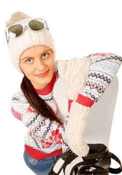 a beautiful woman with a snowboard in studio