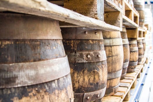 Wooden barrels on a truck - Traditional storage of beer and other alcoholic beverages