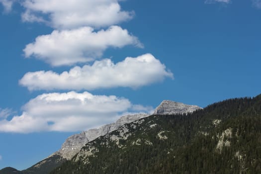 Around the Achensee in Austria - The Karwendel Mountains with smoke signs on the horizon