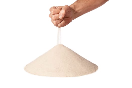 sand running through hand as a symbol for time running out..Isolated on a white background