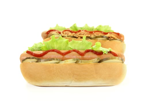 various hot dogs against a white background