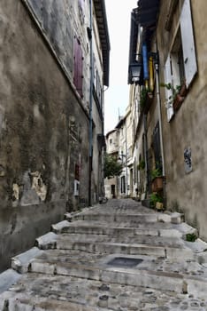 Small narrow street of a village in the South of france
