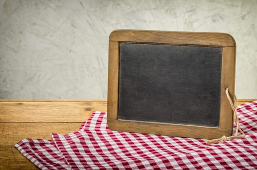 Old slate panel in rustic surroundings