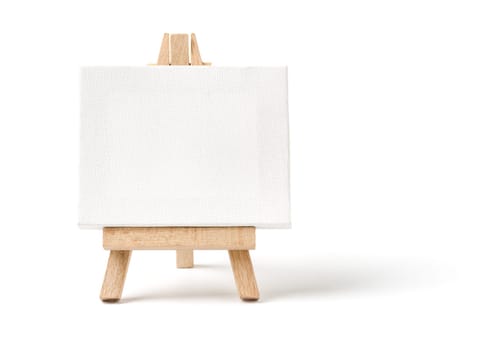 Easel with empty canvas against a white background
