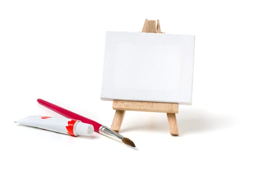 Easel with empty canvas against a white background