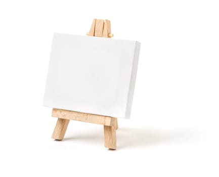 Easel with empty canvas against a white background