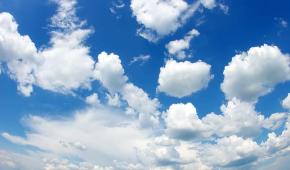 blue sky background with tiny clouds