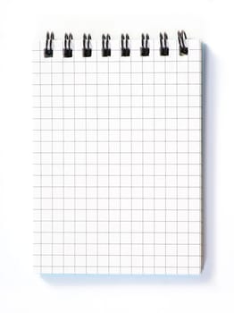blank spiral notepad isolated on white