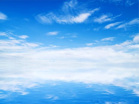 white fluffy clouds with rainbow in the blue sky