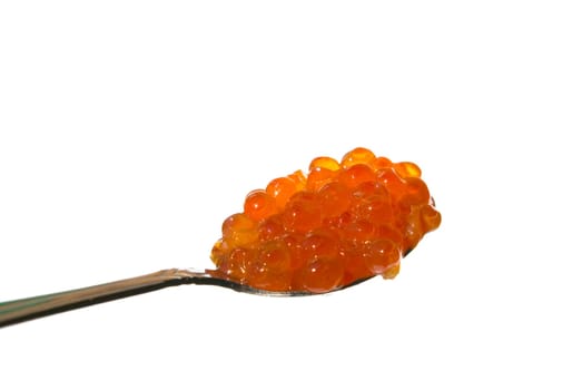 Red caviar on a spoon  isolated on white.