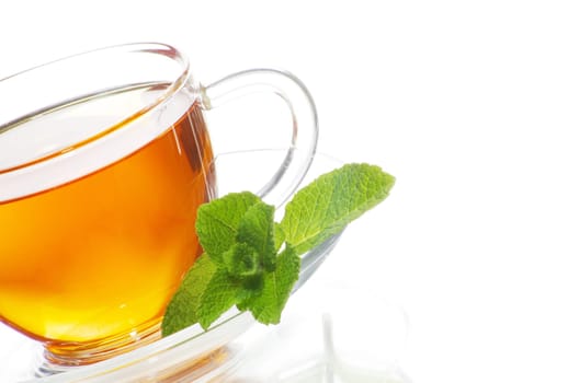 tea in cup with leaf mint  isolated on white background