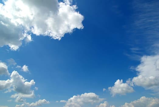 blue sky with clouds and sun