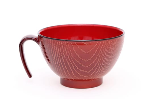 Japanese wooden cup on white background