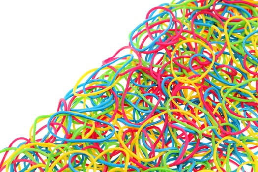 Colorful rubber bands on white background