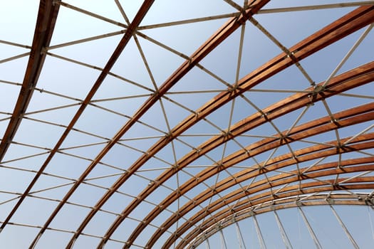 construction of wooden slats against blue sky