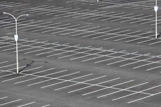 Empty car parking lot with light pole