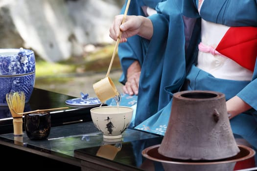 Japanese green tea ceremony in garden